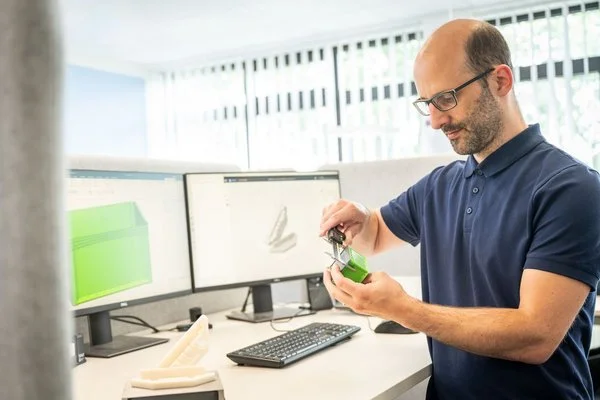 Our packaging designer working on the new product